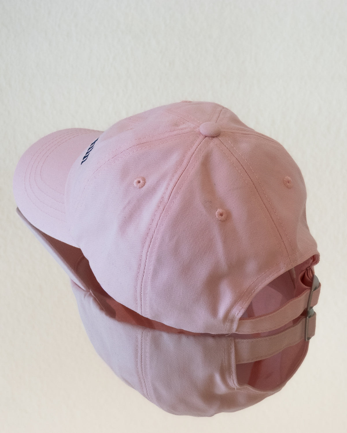 AVE dad cap in pink, back view, brass closure